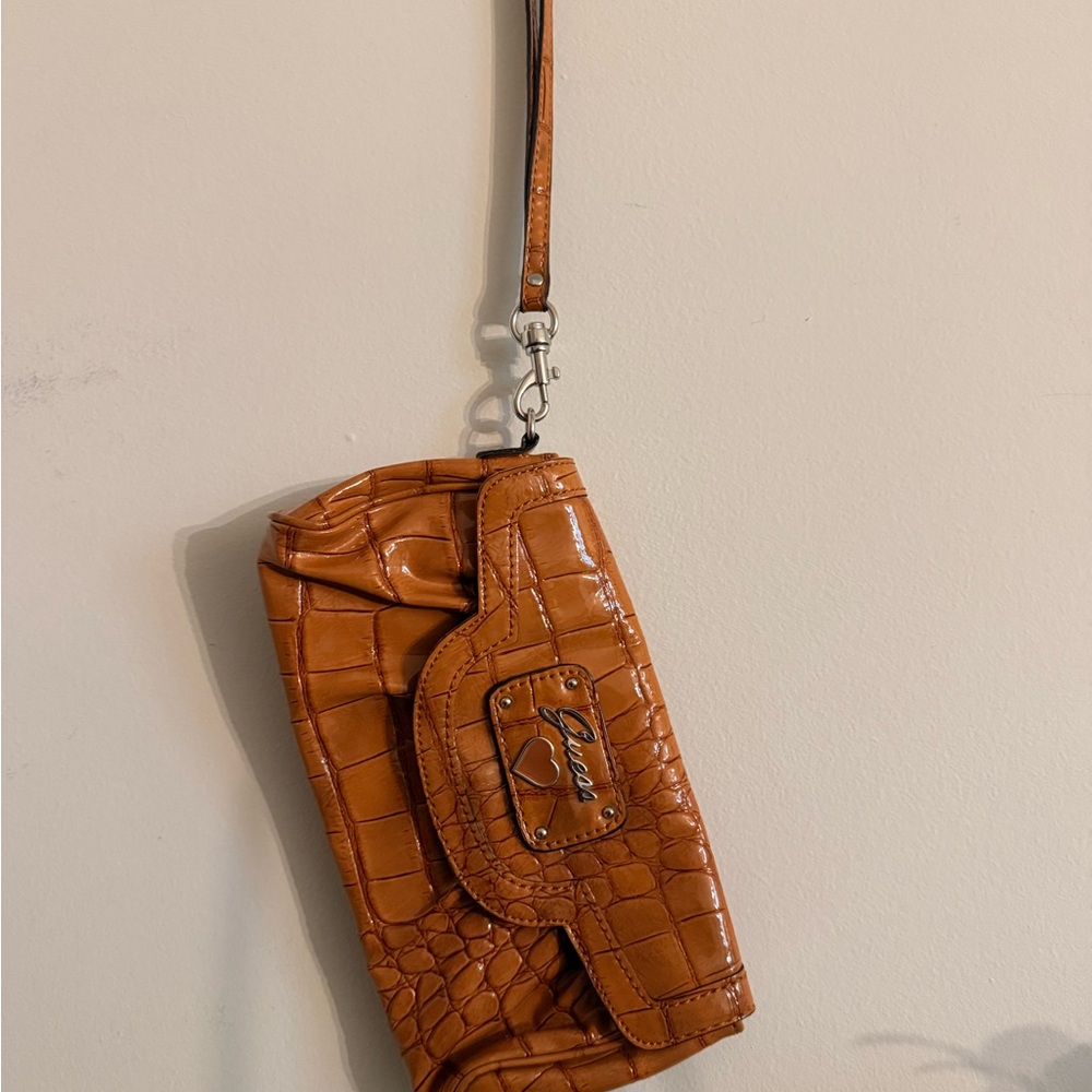 Brown Crocodile Embossed Wristlet by guess